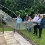 Service uses of Sensory Park installing ClearMesh onto poly tunnel