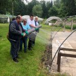 Service uses of Sensory Park installing ClearMesh onto poly tunnel
