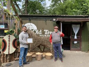 Company director and service user stood outside of Old Tree Nursery reception